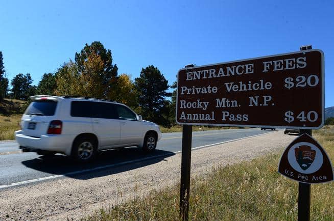 ESTES PARK, CO - SEPTEMBER 25: Cars drive into Rocky Mountain National Park in Estes Park, CO on September 25, 2014.   National park fees may be going up.  (Photo By Helen H. Richardson/ The Denver Post)